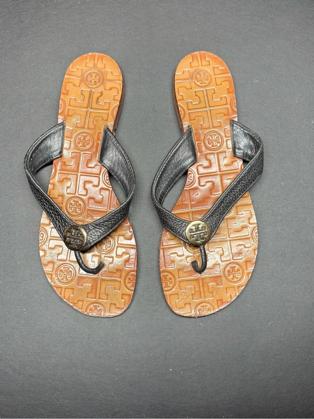 Tory Burch Black Leather Thong Sandals with Brown Logo-Embossed Footbed